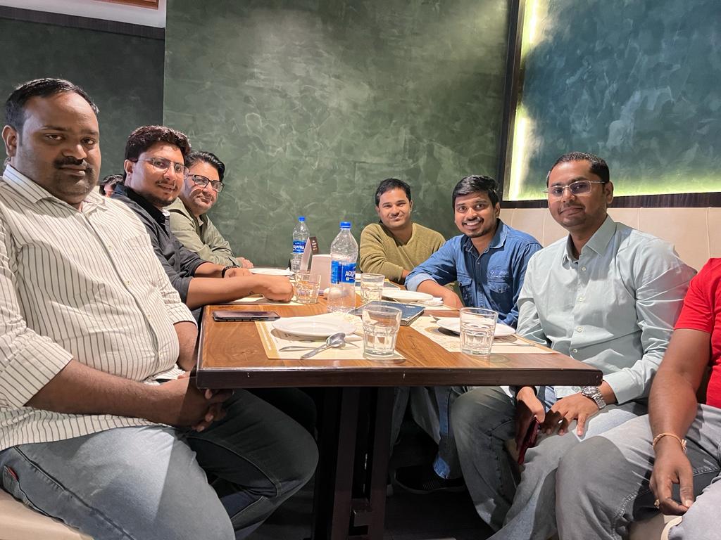 Employees Enjoying lunch with Director Harsha
